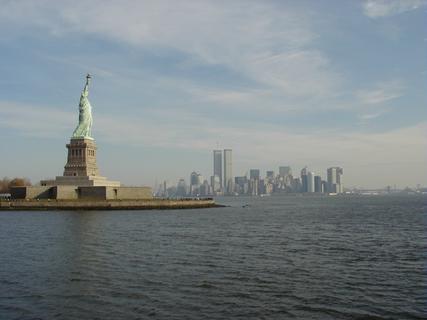 Statue of Liberty and New York City<br>Location: <a href="https://www.google.com/maps/search/?api=1&query=40.68805,-74.04784" target="_new">Liberty Island Ferry</a>